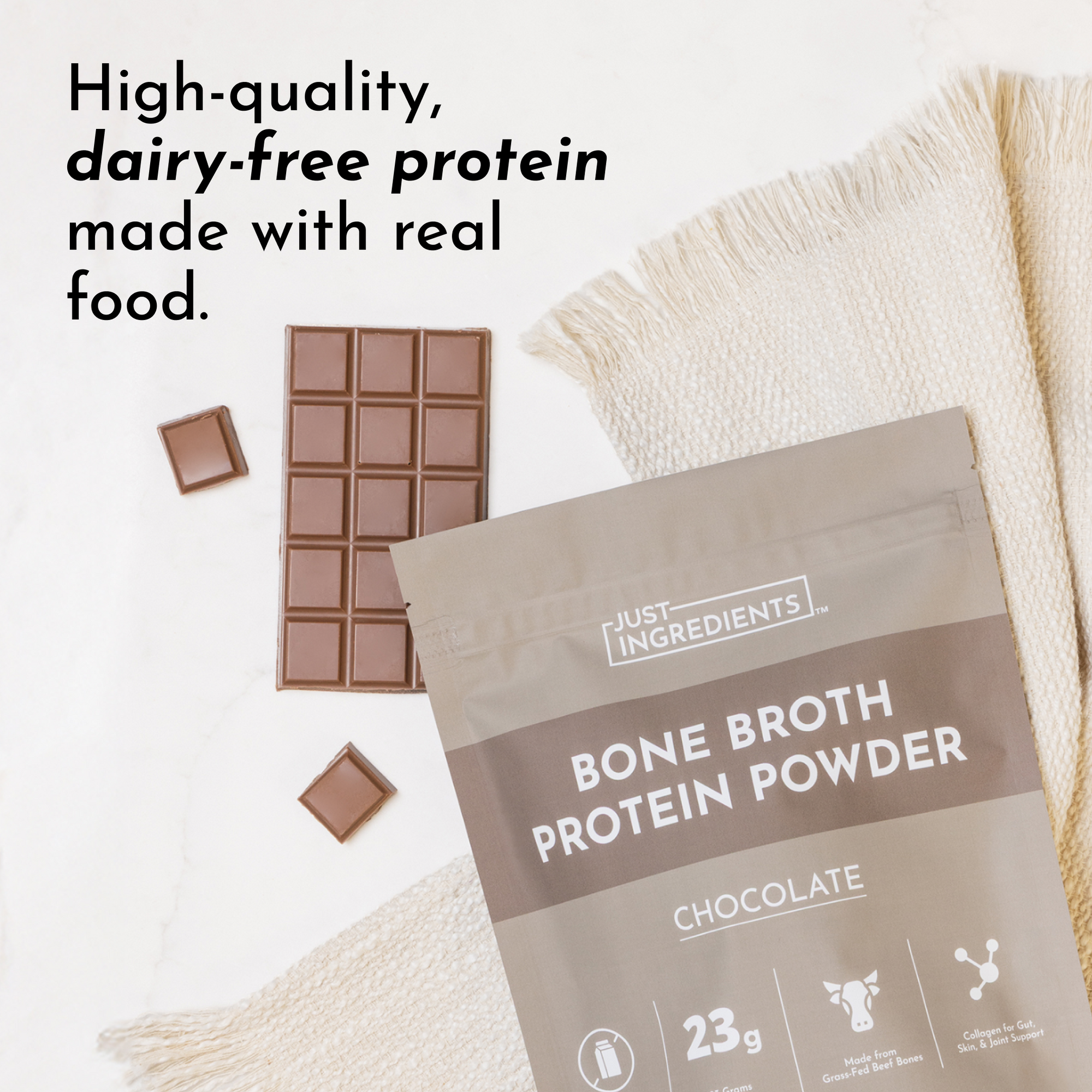 Bag of Just Ingredients Bone Broth Protein Powder with chocolate flavor on a light background