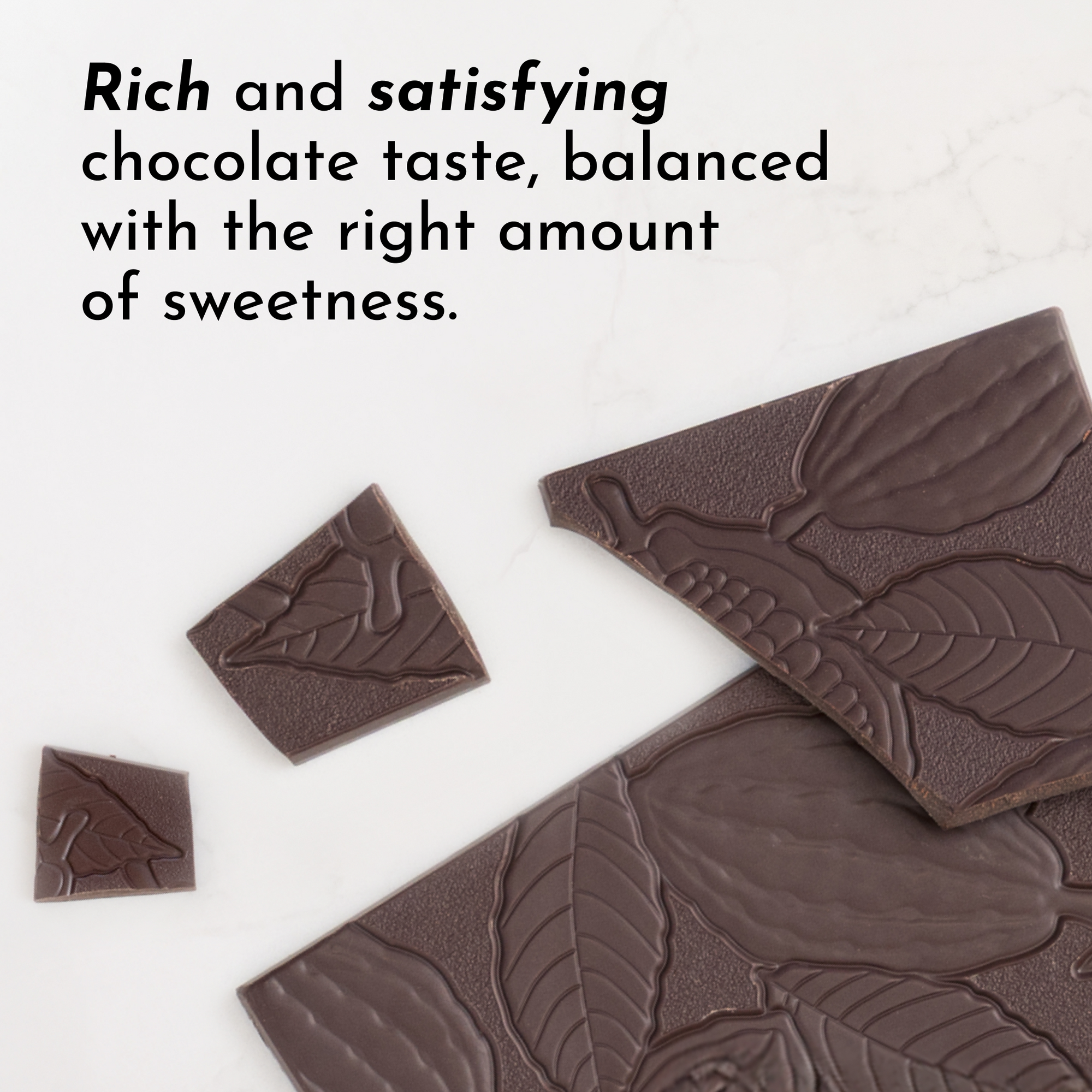 Chocolate bar with leaf patterns on a white background, text describing chocolate taste.